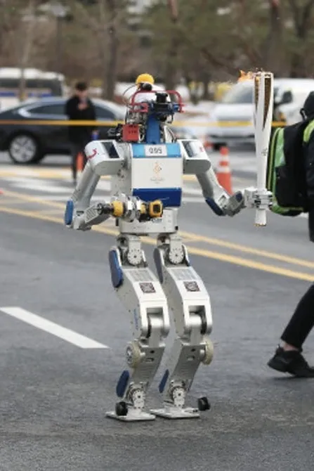 Robot carries the Olympic tourch in South Korea 1