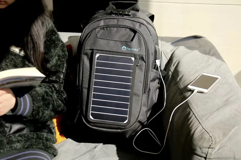 A backpack with a removeable solar charger