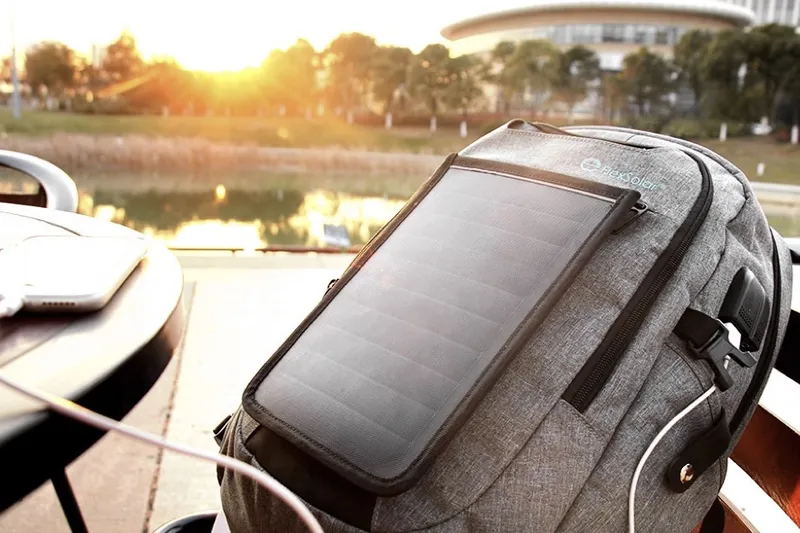 A backpack with a removeable solar charger