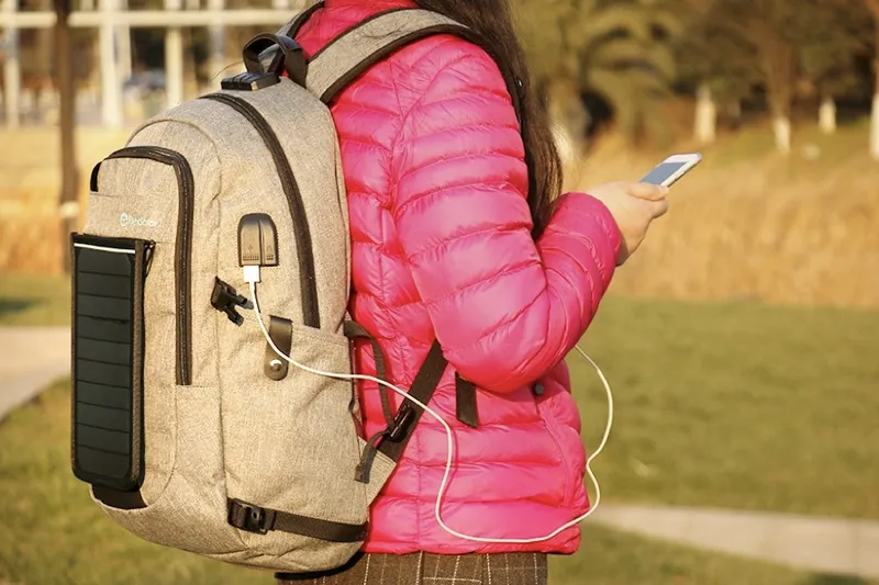 A backpack with a removeable solar charger