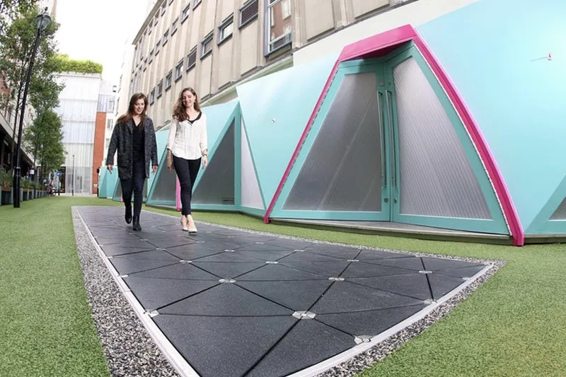 Pavegen Walkway in London turns people's footsteps into electricity!! 1