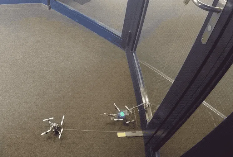 Micro-drones with winches can open doors and lift 40 times their own weight
